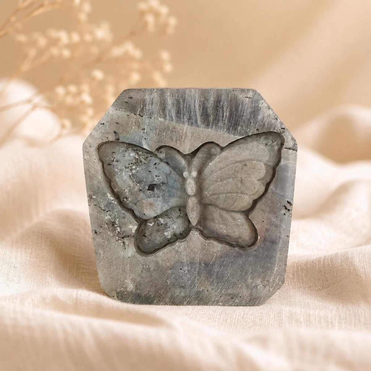 Polished Labradorite butterfly carving with natural grey and blue flash – front view