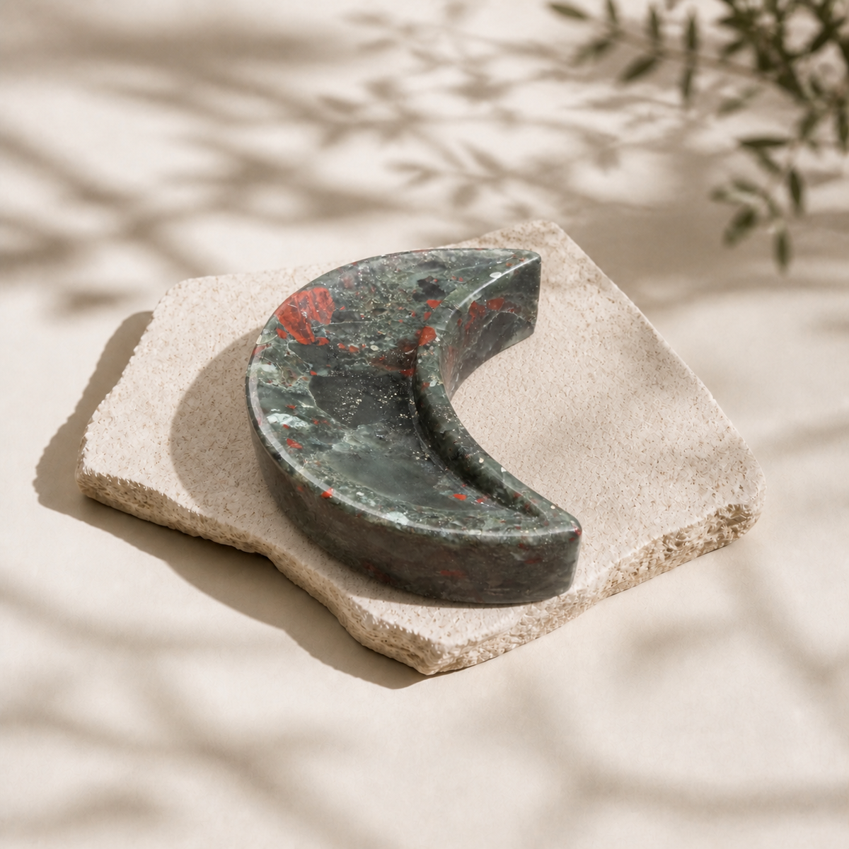 African Bloodstone crescent moon bowl with red mineral markings