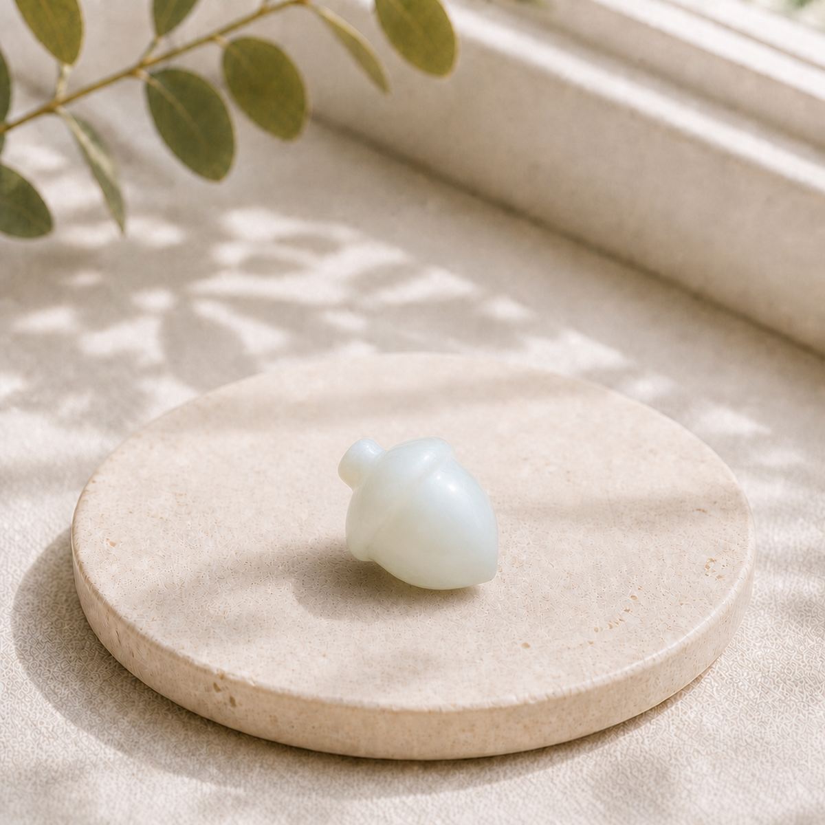 Opalite polished crystal acorn carving