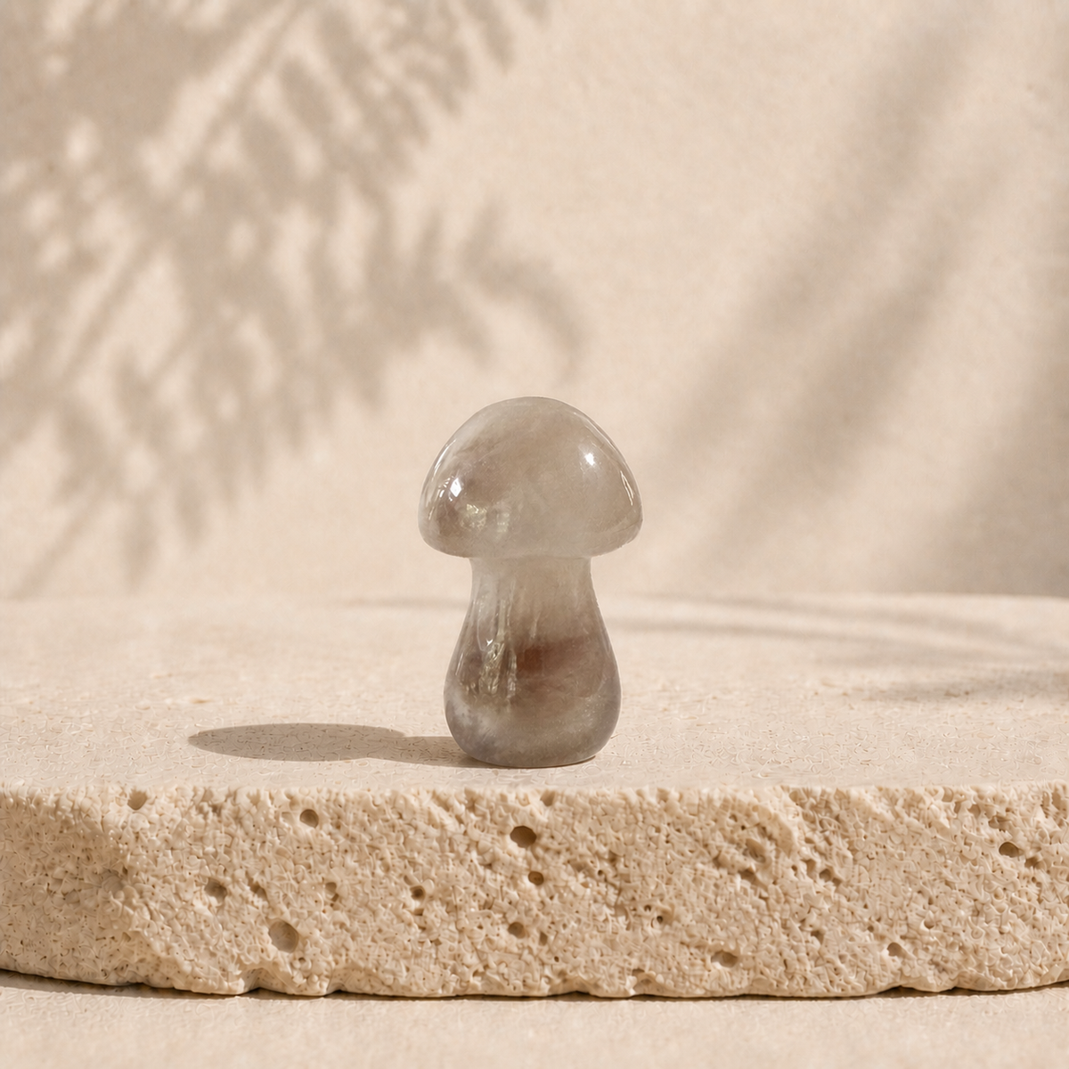 Polished translucent Smoky Quartz crystal mushroom carving